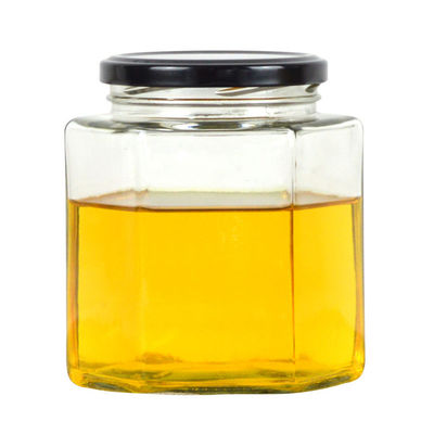 हेक्सागोन क्लियर ग्लास स्टोरेज बोतल 100ml 500ml के लिए शहद क्रीम के लिए धातु ढक्कन के साथ